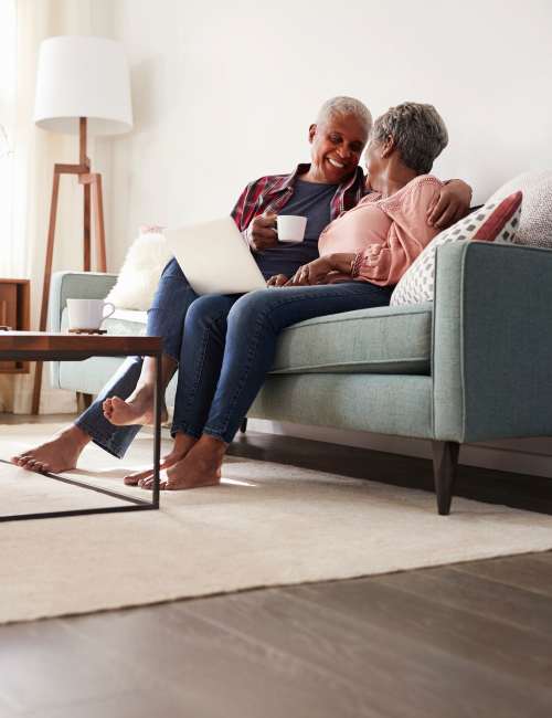 A couple in their living room at The Heights in La Puente, California