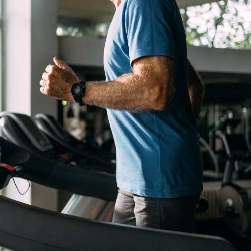 Man running in the treadmill at Cedar Glen Apartments in Cross Plains, Wisconsin