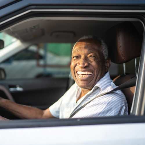 Resident smiling and enjoying the outdoors at The Bonifant in Silver Spring, Maryland