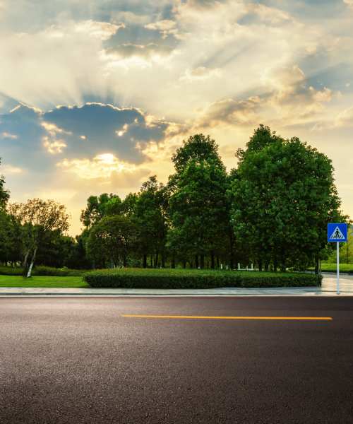 Sunset over tree-lined street near Glennview Apartments in Washington Court House, Ohio
