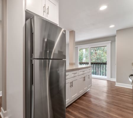 Renovated kitchen, stainless steel refrigerator at Vista Creek, in Castro Valley, California.