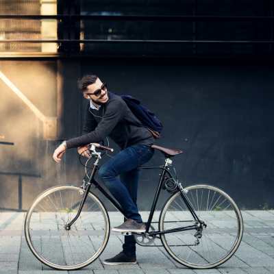 A resident rides his bike near Terra Apartments, Austin, Texas