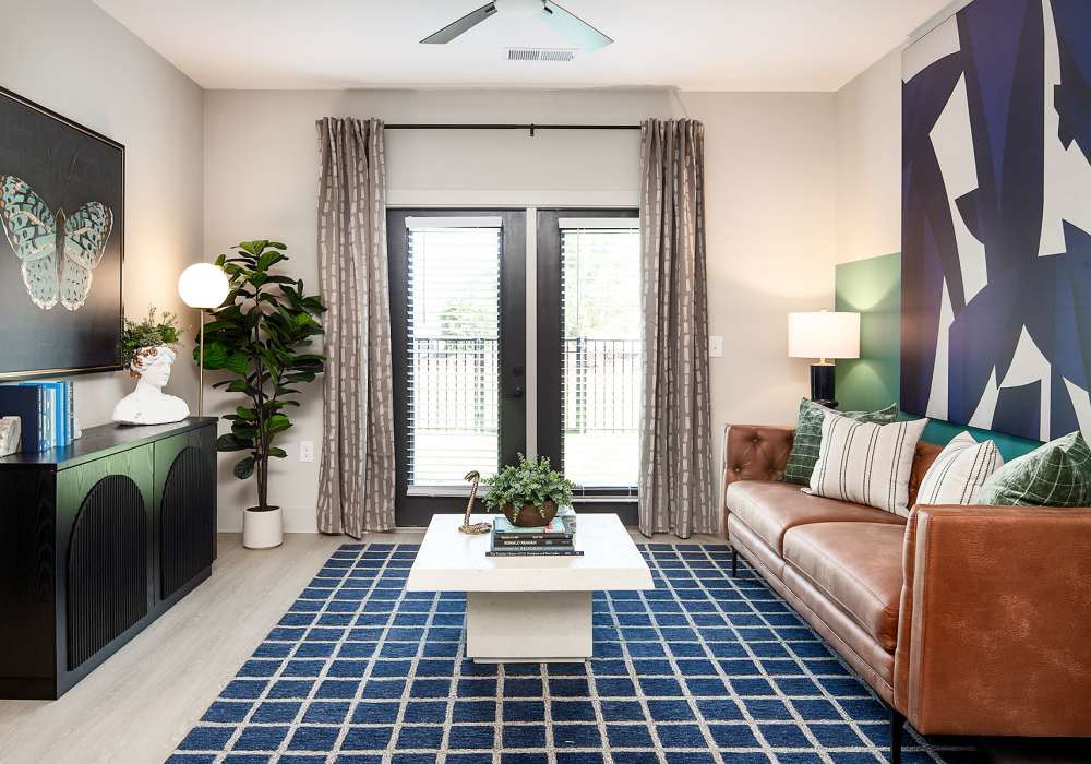 Large living room with large couch at Cypress Point in Mooresville, North Carolina.