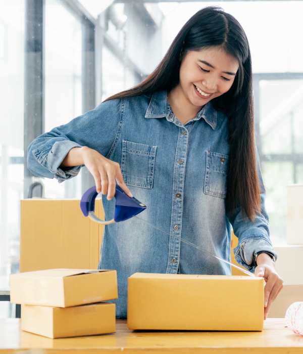Customer packing boxes near Storage Hub - Grissom & Tezel in San Antonio, Texas