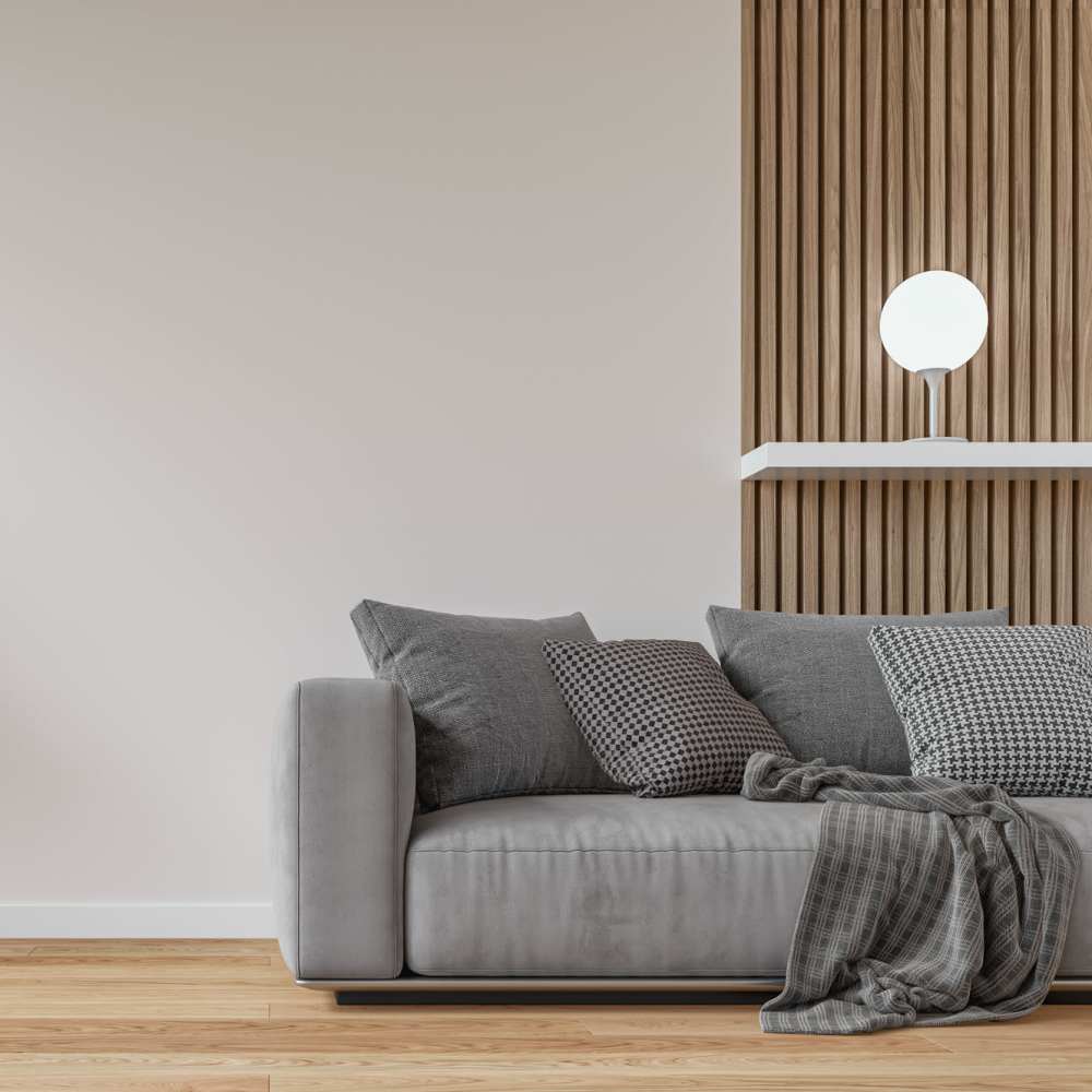 Living room with a couch at Fair Oaks Apartments in Sacramento, California