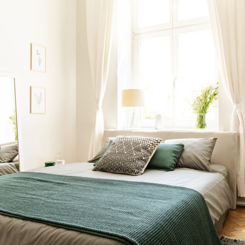 A cozy bedroom at Seaside Village in Oceanside, California