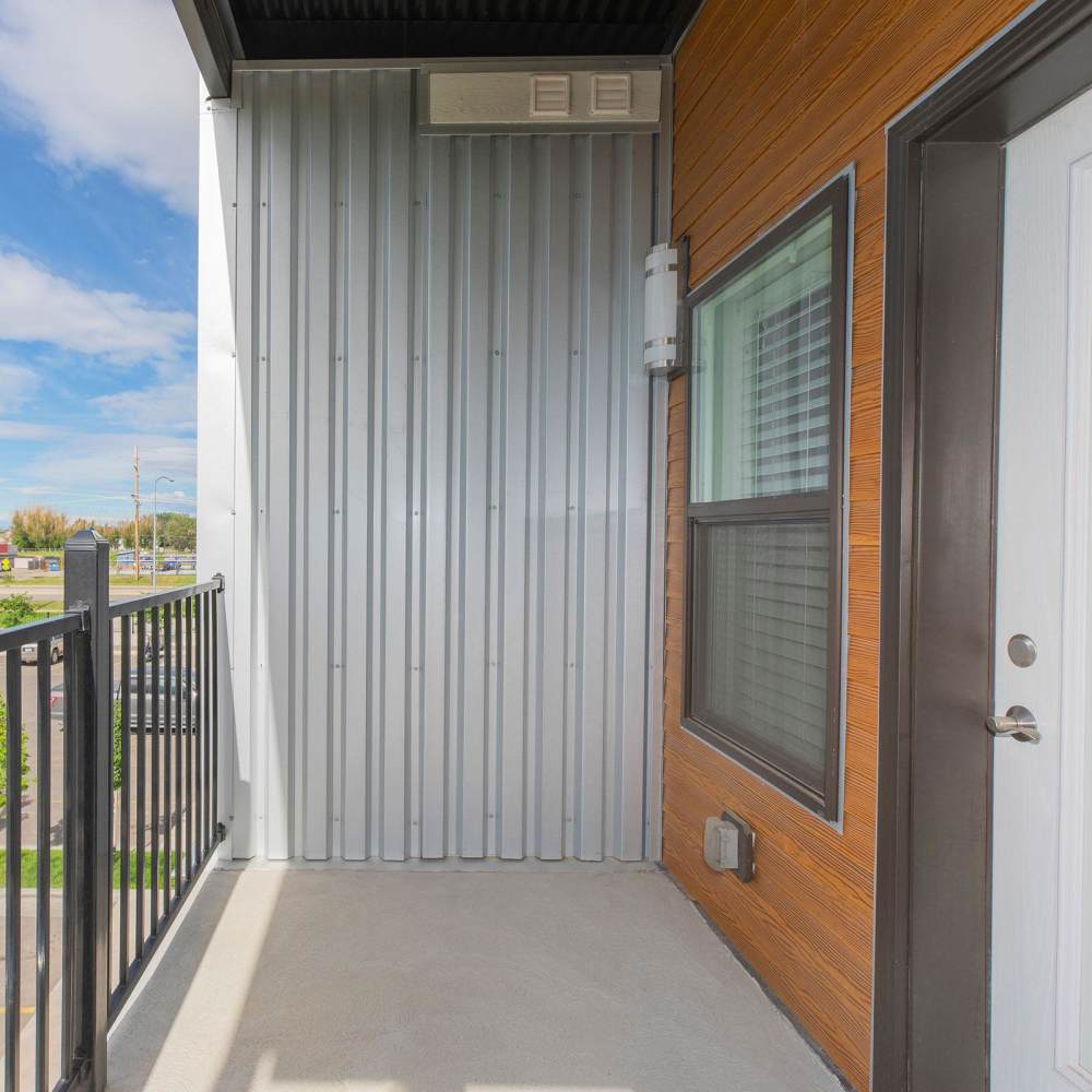 Patio with metal railing at Shiloh Commons in Billings, Montana