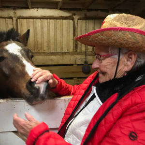 Resident Mary Anne at stables near Edencrest at Green Meadows in Johnston, Iowa.