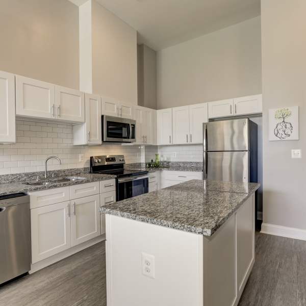 Kitchen with stainless-steel appliances at Messenger Place, Manassas, Virginia