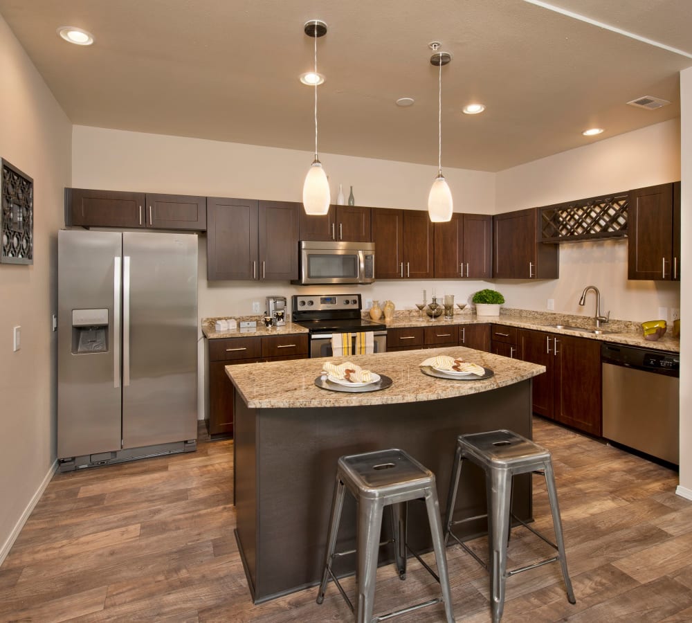 Luxury kitchen with stainless-steel appliances at Altamont Summit in Happy Valley, Oregon