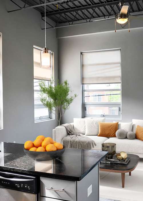 A furnished living room and kitchen counter at Eclipse Apartments in Richmond, Virginia