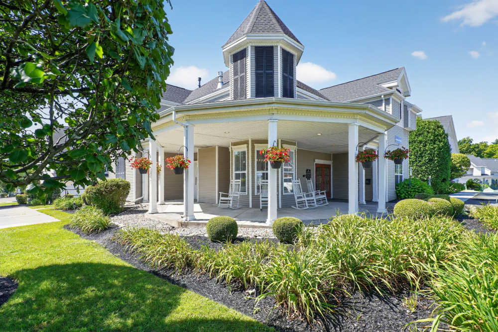 Community exterior view with lawn at Mansions at Delmar, an Eagle Rock Community in Delmar, New York