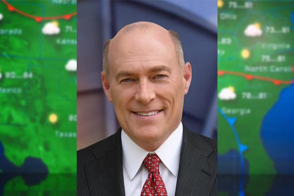 Bust photo of meteorologist James Spann with weather screen background