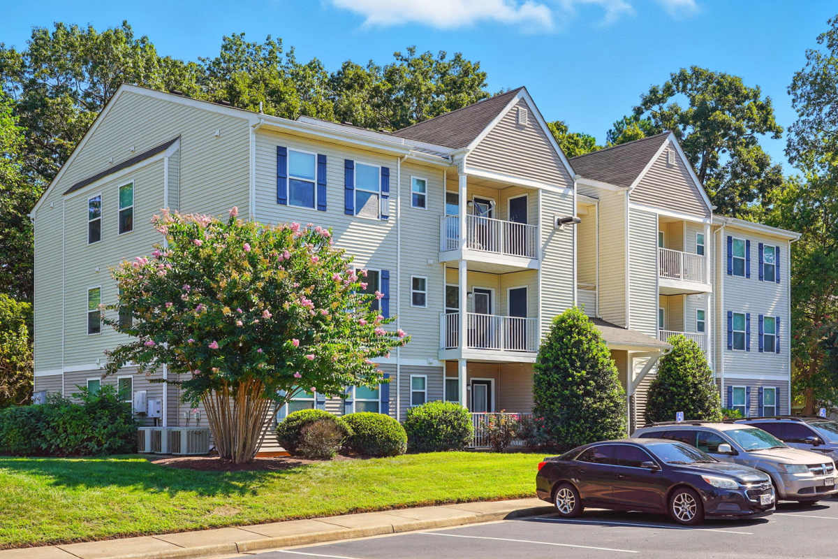 Building Exterior with Balconies & Patios at Monmouth Woods in King George, Virginia
