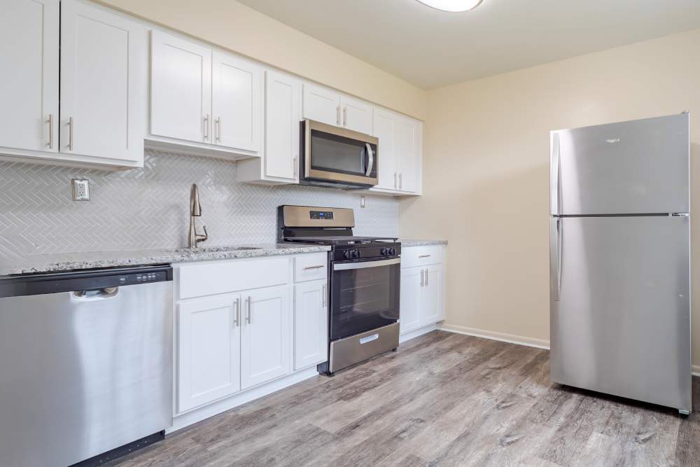 Model kitchen and dining area at Congress Apartment Homes in Allentown, Pennsylvania