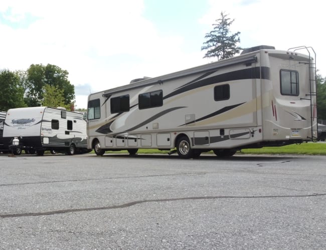 A row of RVs conveniently parked at Storage World in Womelsdorf, Pennsylvania
