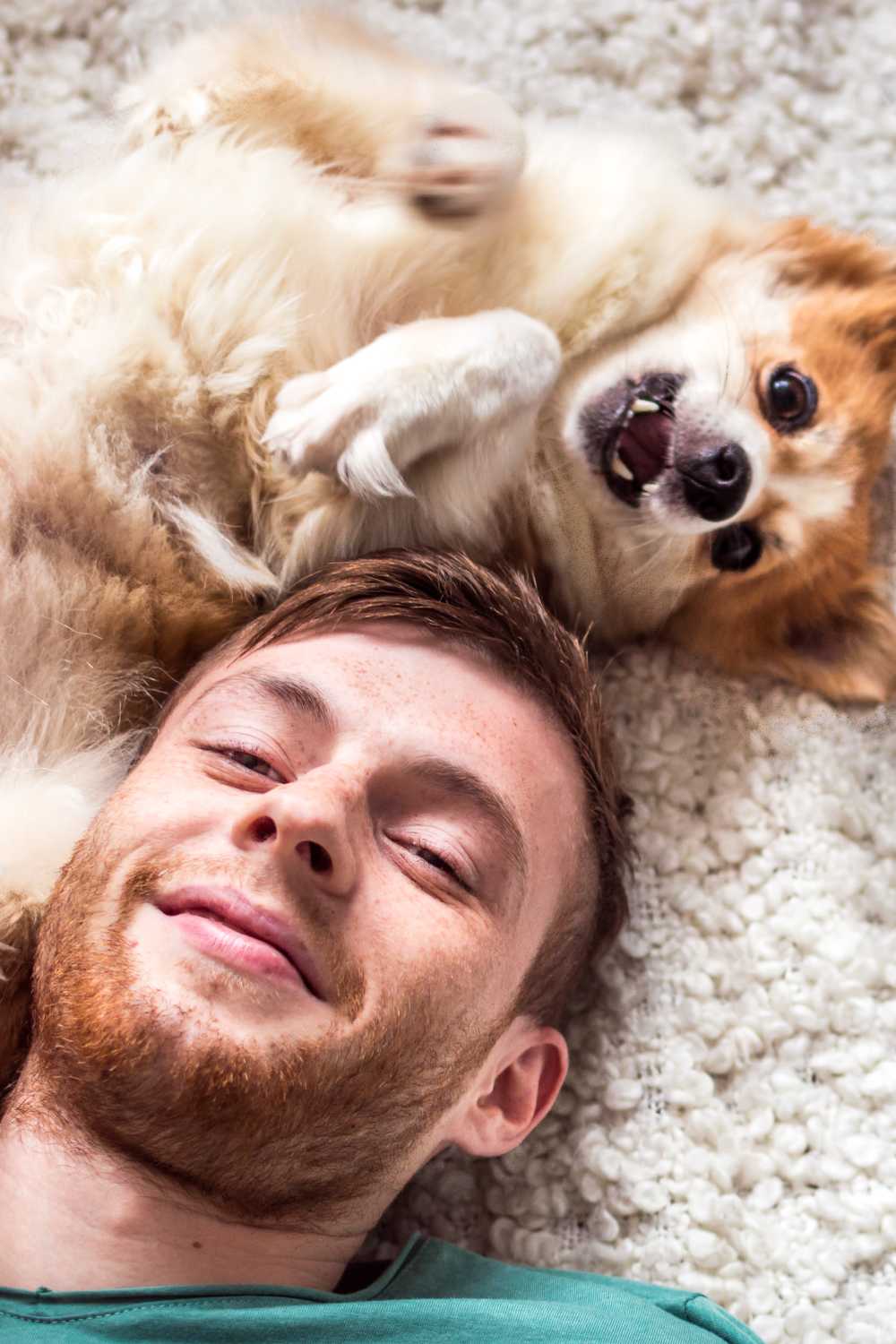Resident playing with his dog at Avion Apartments in Jacksonville, Florida