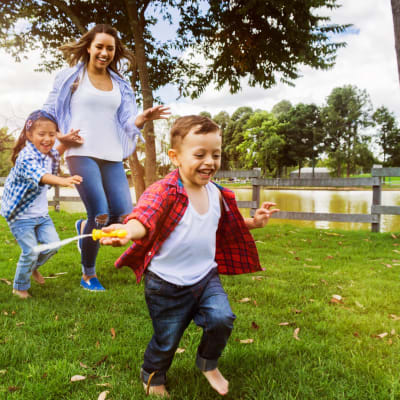 A family playing at a park near Columbia Colony in Patuxent River, Maryland