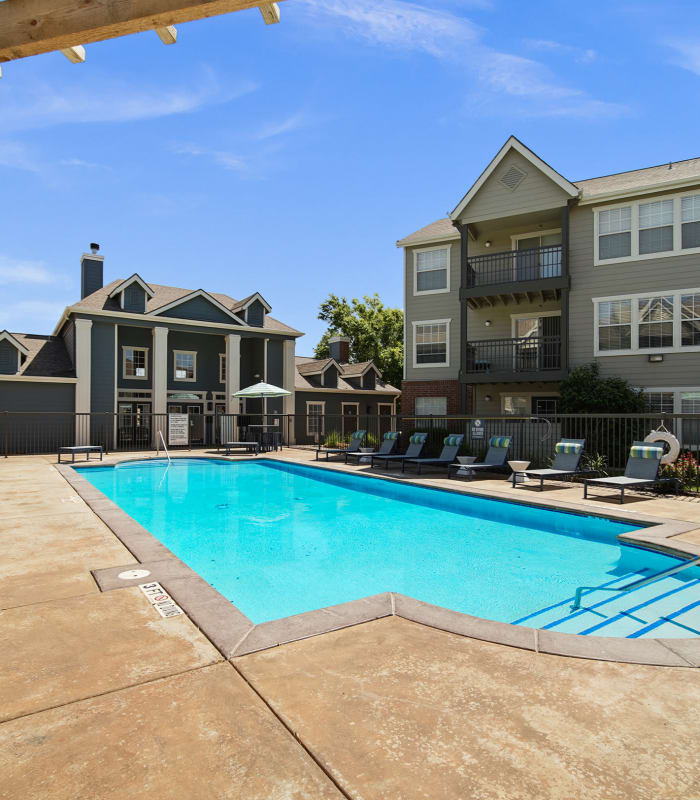 Exterior with pool to Remington Apartments in Amarillo, Texas