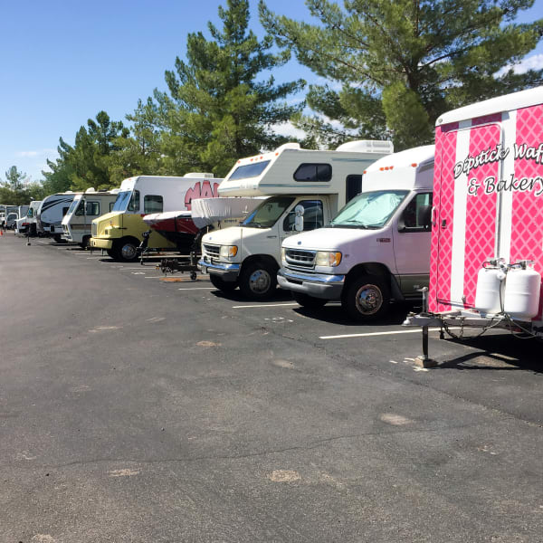 RVs and trailers parked at StorQuest Self Storage in Dallas, Texas