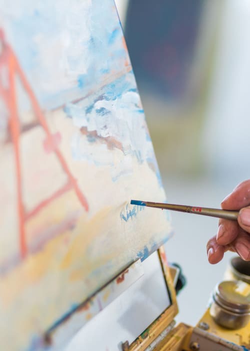 Resident painting at Sunstone Village in Denton, Texas