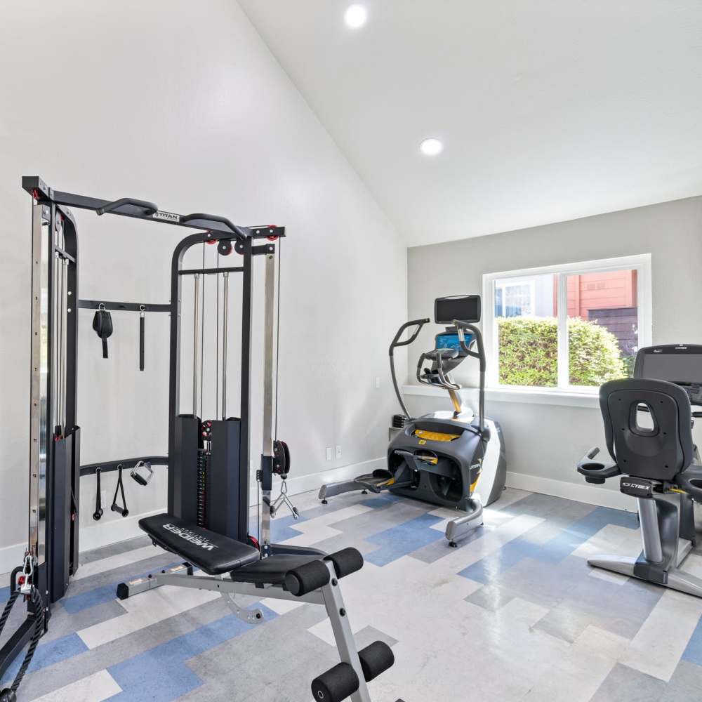 Well-equipped fitness center at Crossbrook Apartments in Rohnert Park, California