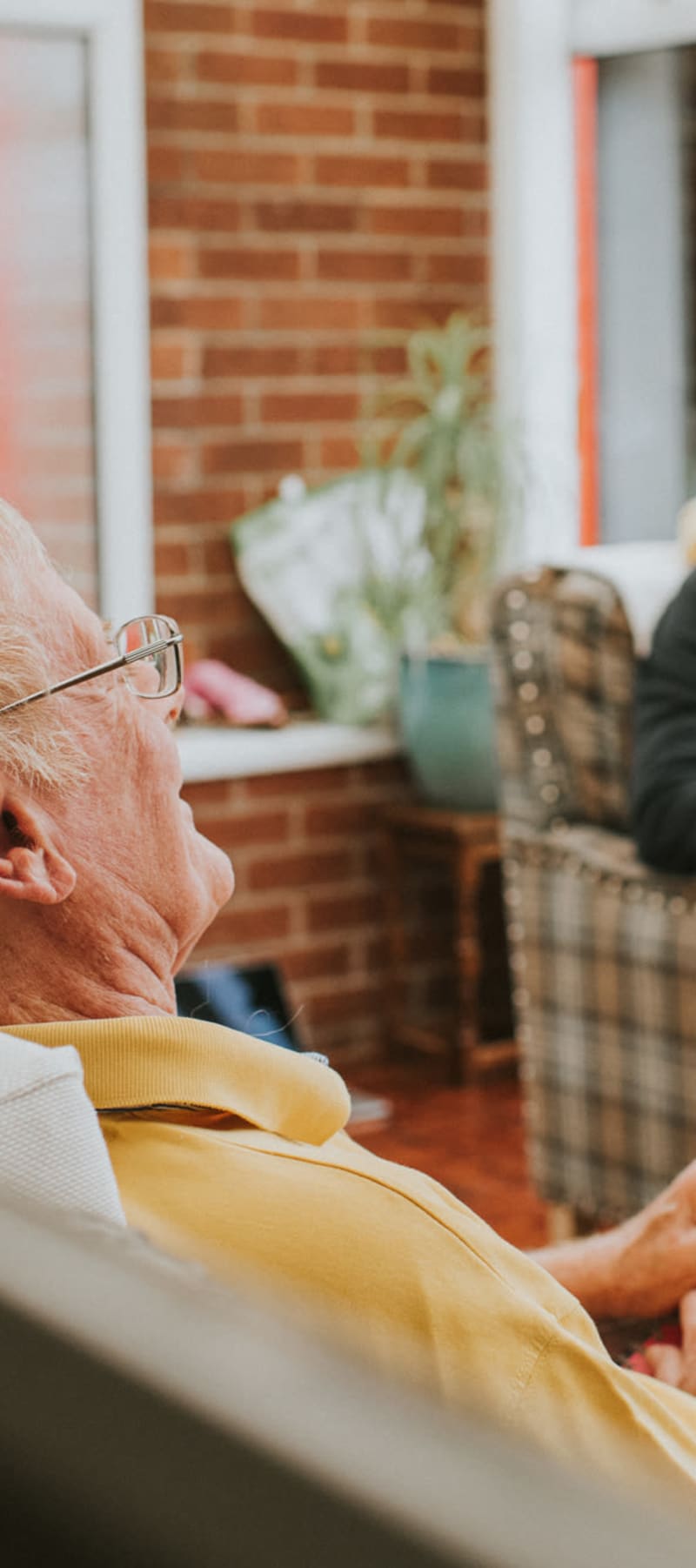 Group of residents talking in a common area at Wellington Meadows in Fort Atkinson, Wisconsin