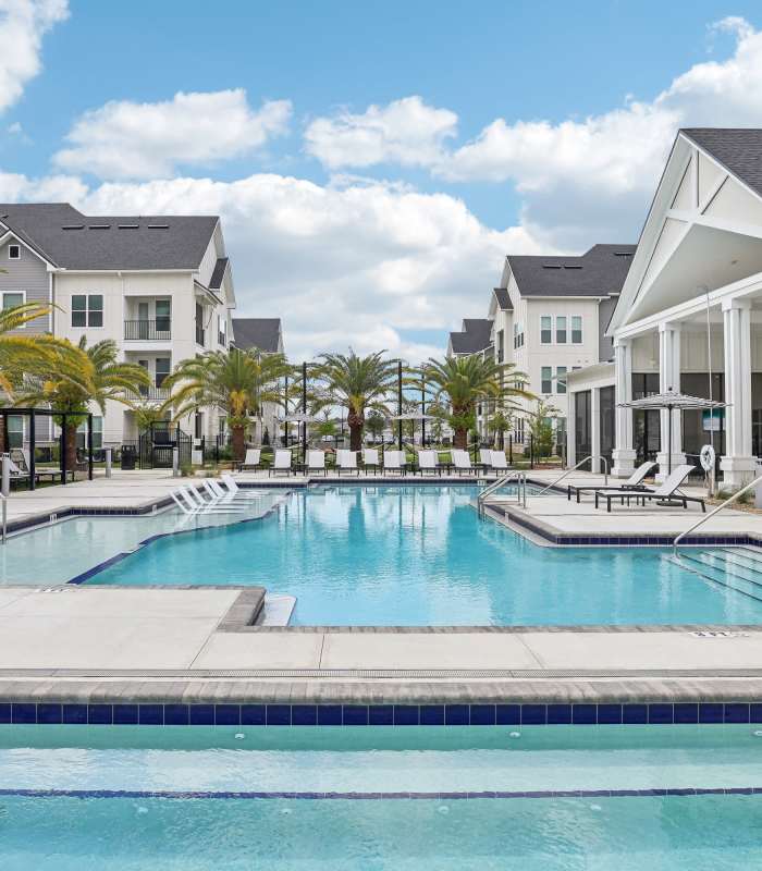 Dusk view of Pool at firepits at The Southerly at Orange City in Orange City, Florida