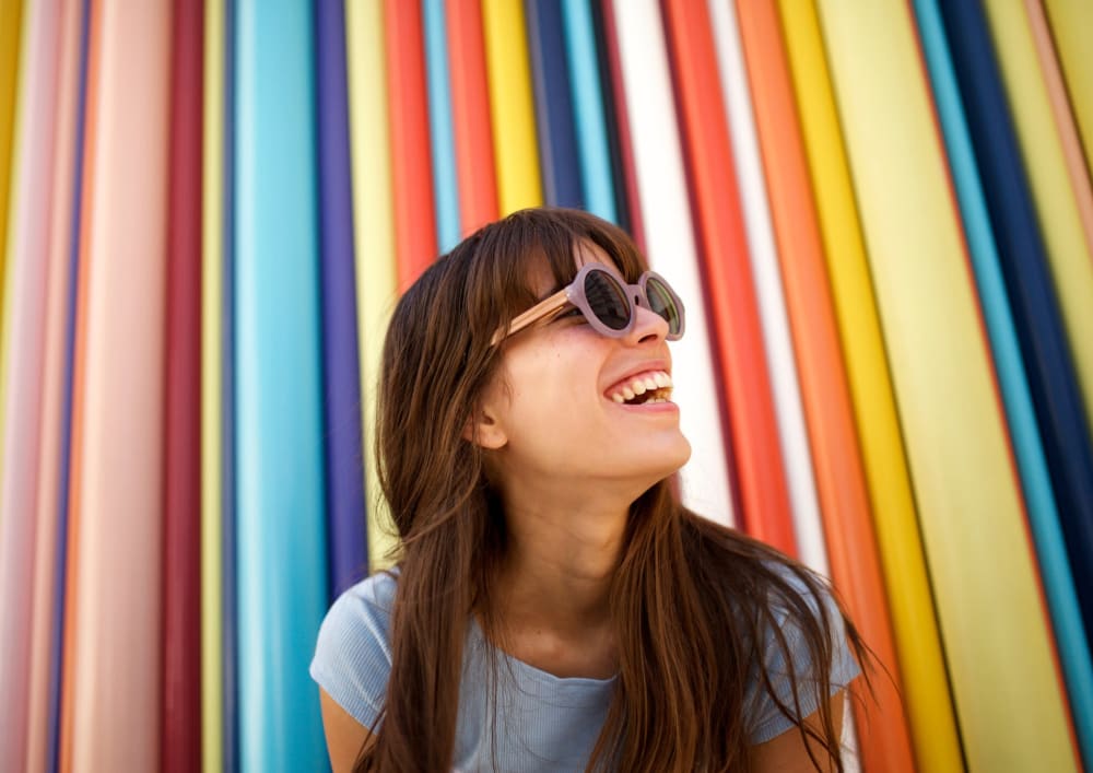 Resident with colorful backdrop at Tanglewood in Davis, California