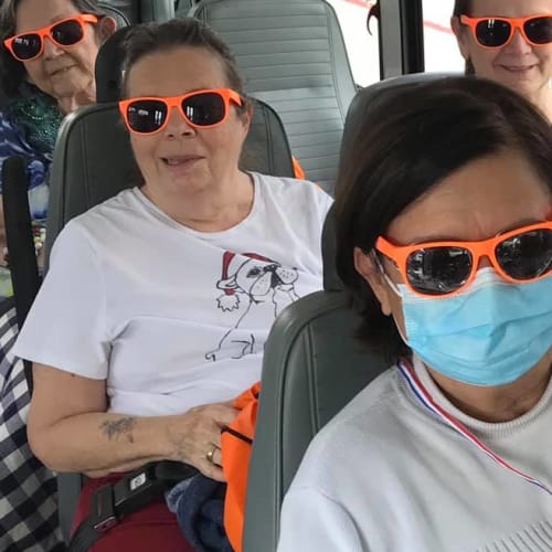 Residents on the bus at The Oxford Grand Assisted Living & Memory Care in McKinney, Texas