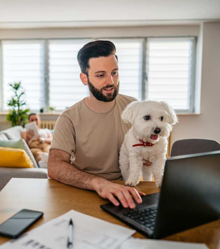 A resident holding his dog at Cornell Midtown in Dallas, Texas 