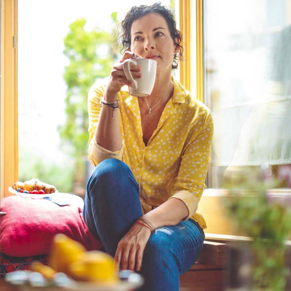 Senior resident drinking coffee at Farrington Trace Senior in Greenville, North Carolina
