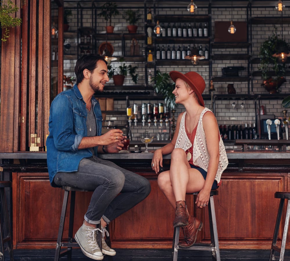 Resident couple out for drinks on date night near Sofi Ocean Hills in Oceanside, California