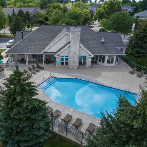 Dog sitting on it's bed at Deer Creek in Middleton, Wisconsin