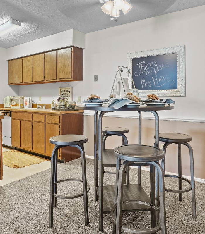 Kitchen with granite countertops at Raintree Apartments in Wichita, Kansas