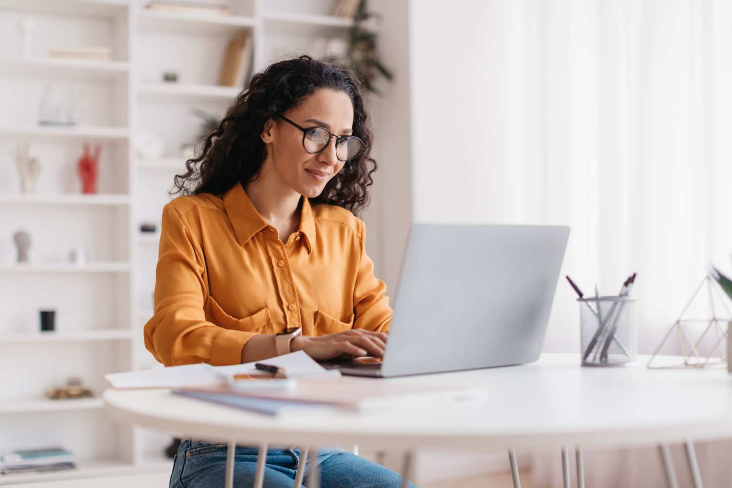 Resident woman using the online payments portal at Bristol Square in Crowley, Texas