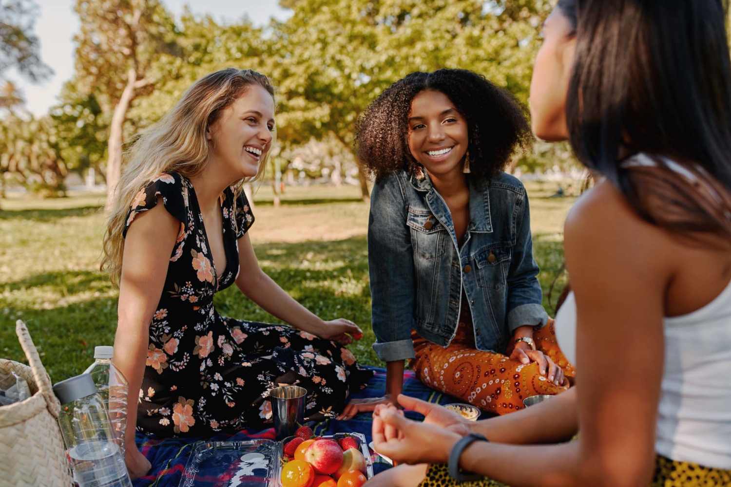 A group of friends in a nearby park at Clairewood Apartments in Saint Clair, Michigan