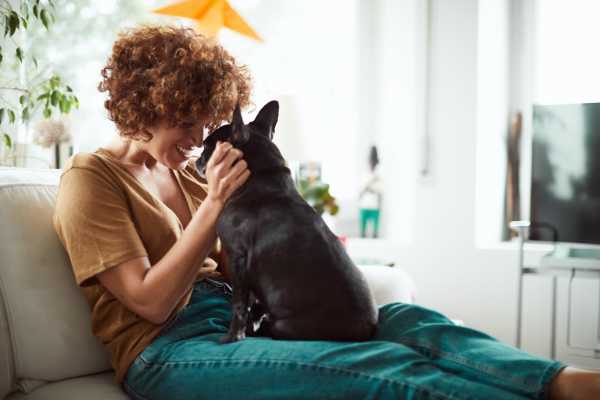 Happy resident and her pup at Bristle Pointe Apartments in Reno, Nevada
