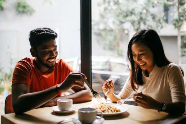 Residents couple having breakfast and coffee in a restaurant near Napa Creek Terrace in Napa, California
