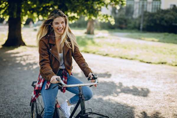 A resident riding her bike at a park near Napa Creek Terrace in Napa, California