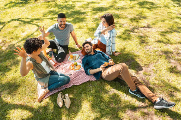 A group of friends spending their time in a park near  Archer Medical District in Dallas, Texas