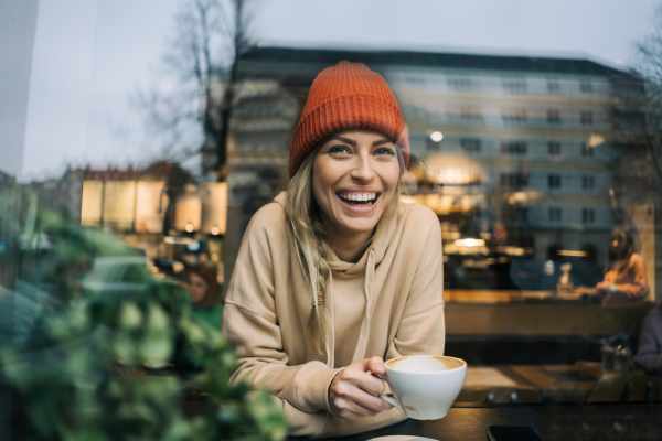 Resident woman having coffee near Glenridge Gardens in Augusta, Maine