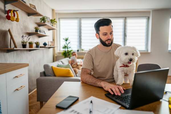 Happy puppy and her owner in their new home at Milwee Street Apartments in Houston, Texas