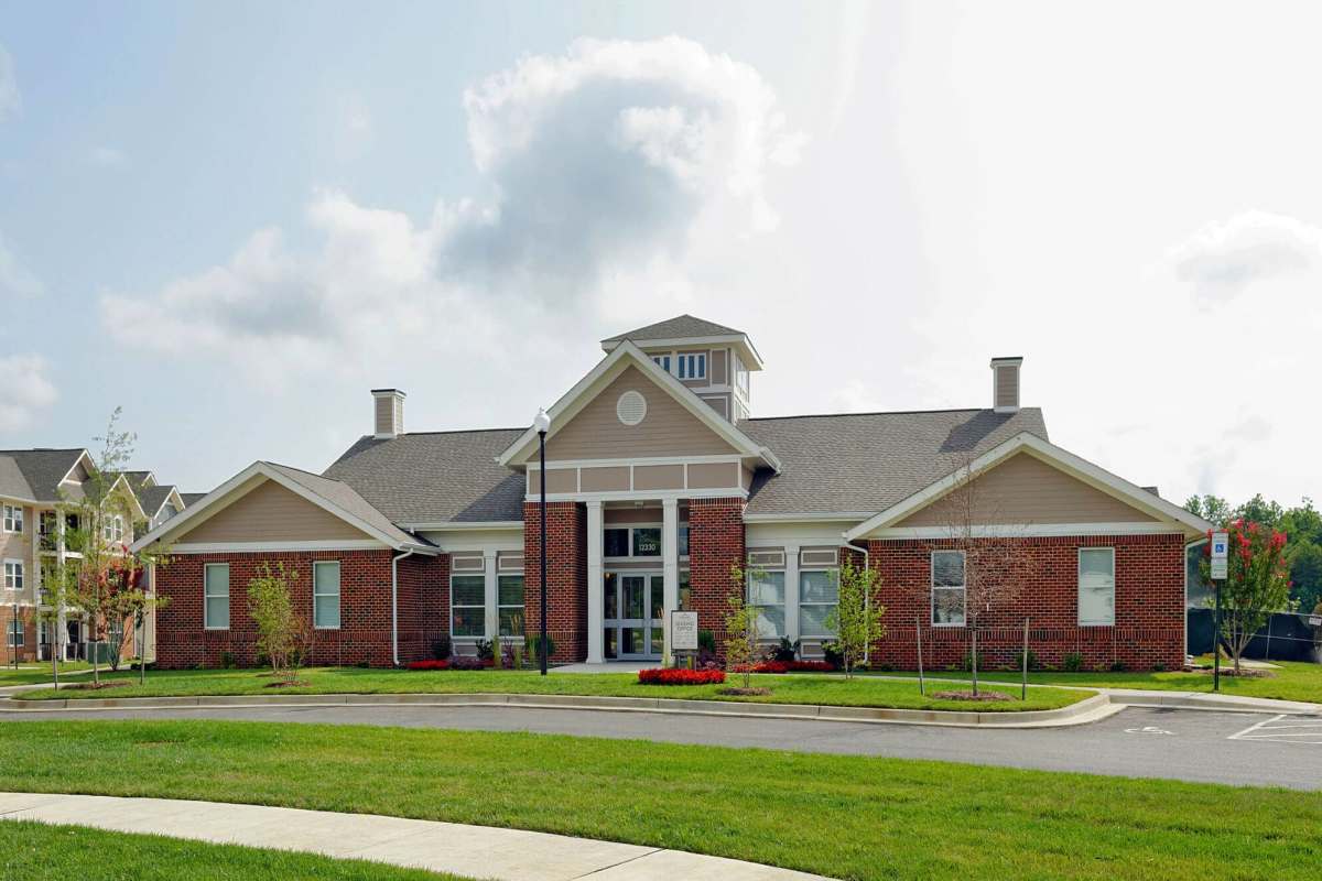 Exterior of the apartment building at Adams Crossing Apartment Homes in Waldorf, Maryland