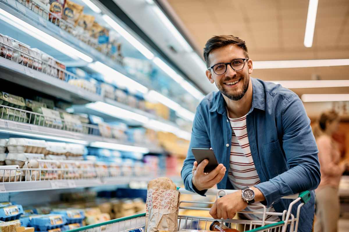 Resident buying grocery near Broadstone II in Bel Aire, Kansas