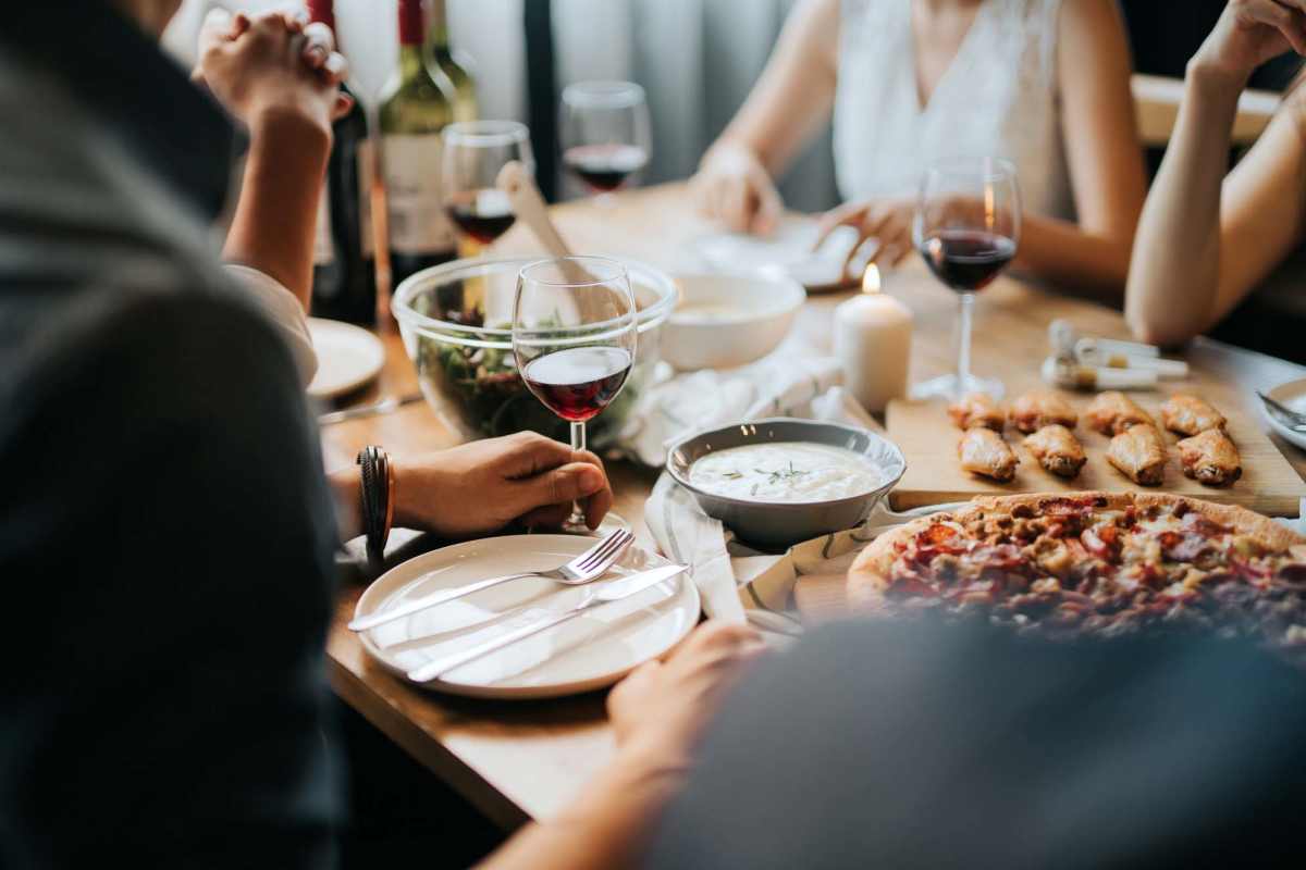  Residents having delicious food at a restaurant near Amber Ridge in Angleton, Texas