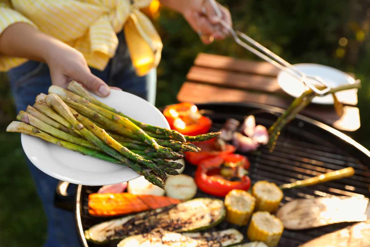 Resident cooking BBQ at Eastland Apartments in Tulsa, Oklahoma