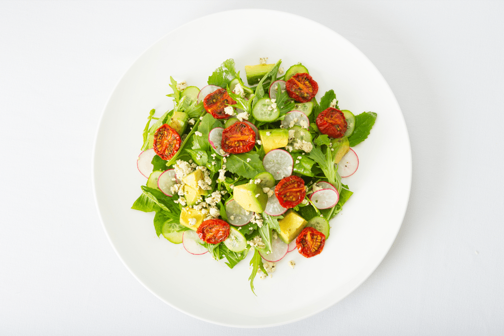 Garden salad on a while plate at The Manor at Market Square in Reading, Pennsylvania