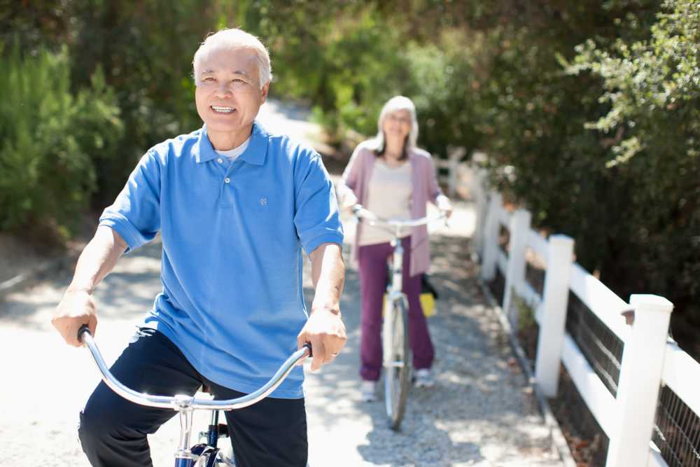Resident on a cycle near Watermere on Oak Street in Roanoke, Texas
