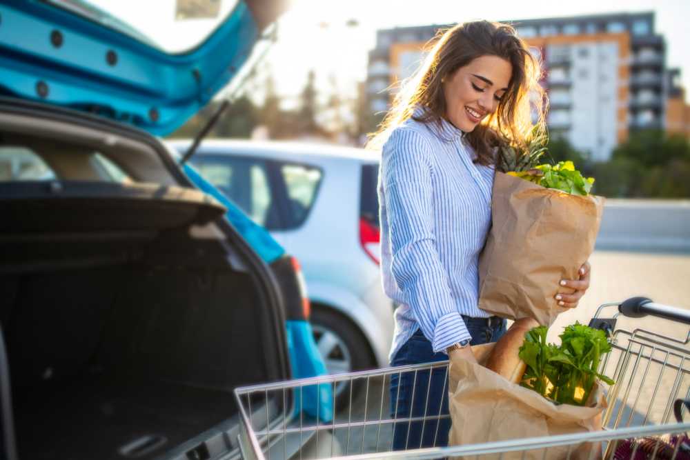 Woman shopping for vegatables at Gaithersburg, Maryland near Corrigan Square Apartments
